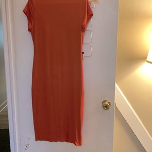Form-fitting burnt orange dress